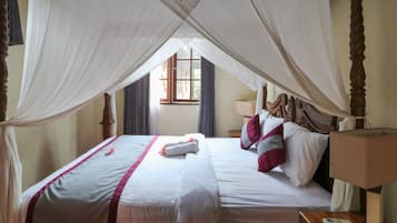 Suite | Desk, bed sheets