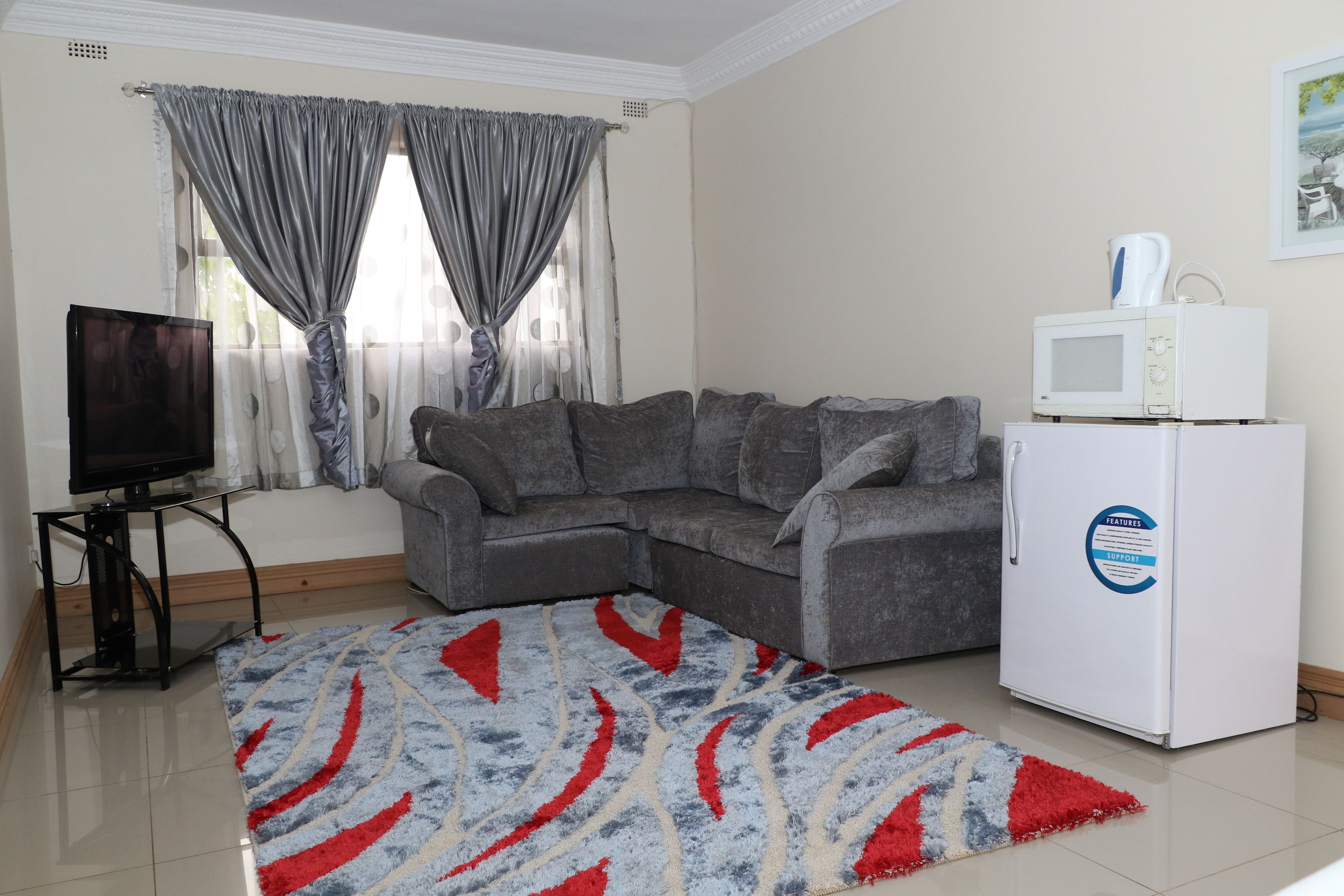 Apartment, 2 Queen Beds, Accessible, Pool View | Living area | Flat-screen TV