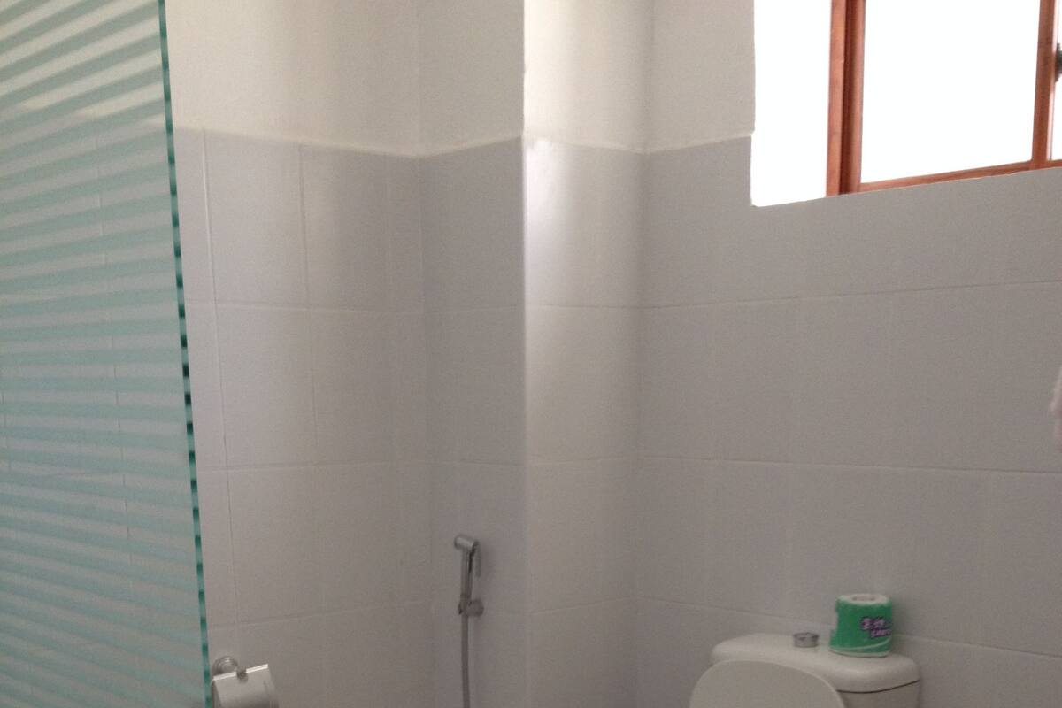 Shower, free toiletries, slippers, towels