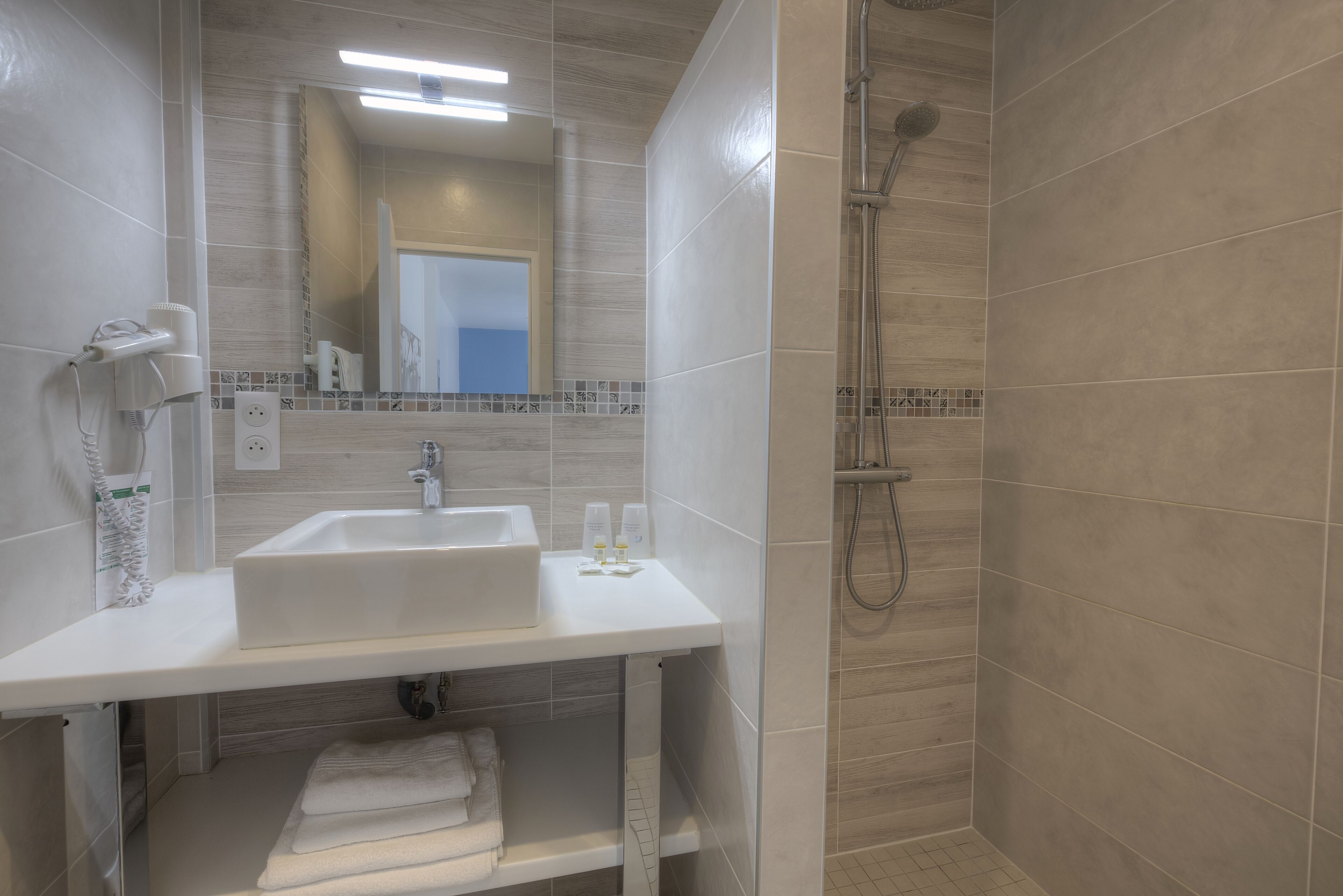 deluxe double room, 1 queen bed | bathroom | shower, free toiletries, hair dryer, towels