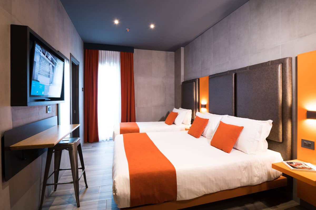 Standard Triple Room | 1 bedroom, down duvets, minibar, in-room safe