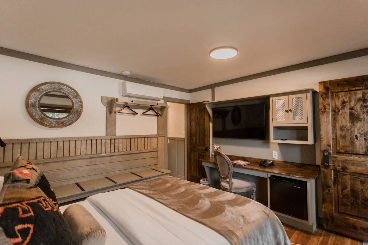 Premium bedding, memory foam beds, desk, laptop workspace