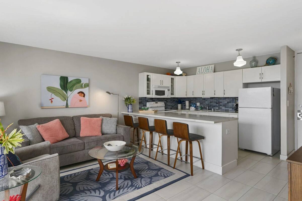 Suite Premium, 1 cama King size y sofá cama, vista al océano | Cocina privada | Cafetera y tetera, refrigerador, microondas y horno 