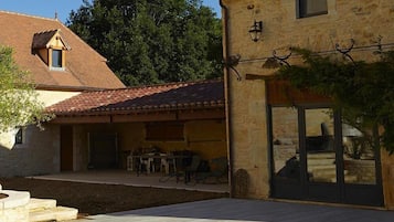 Seasonal outdoor pool, open 9:00 AM to 10:00 PM, pool umbrellas