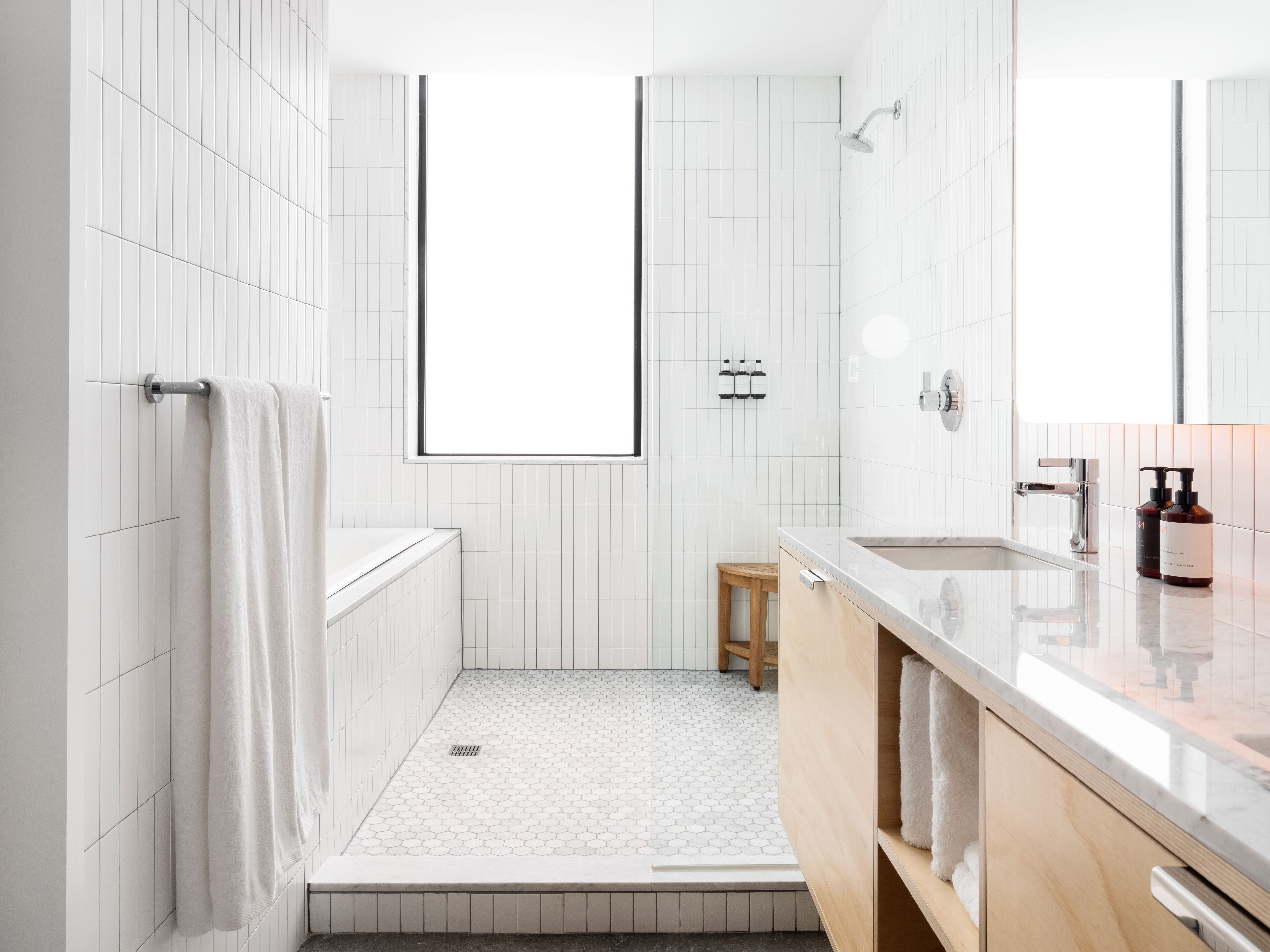 designer toiletries, hair dryer, bathrobes, towels