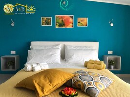 Suite Deluxe, vistas al mar | Escritorio, cortinas opacas, sistema de insonorización y wifi gratis