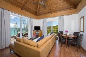 Living and dining area with ocean views