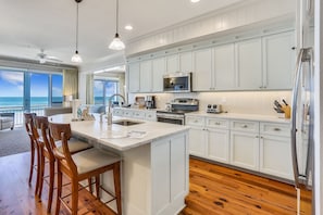 Fridge, microwave, oven, stovetop - Mainsail Beach Inn 3 Bedroom Beach Front unit (Holmes Beach)