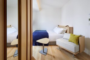 Premium bedding, free minibar, in-room safe, blackout drapes