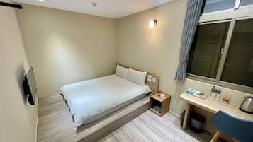 Desk, blackout curtains, free WiFi, bed sheets