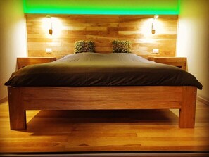 Premium bedding, down comforters, memory foam beds, in-room safe