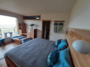 Premium bedding, down duvets, memory-foam beds, in-room safe