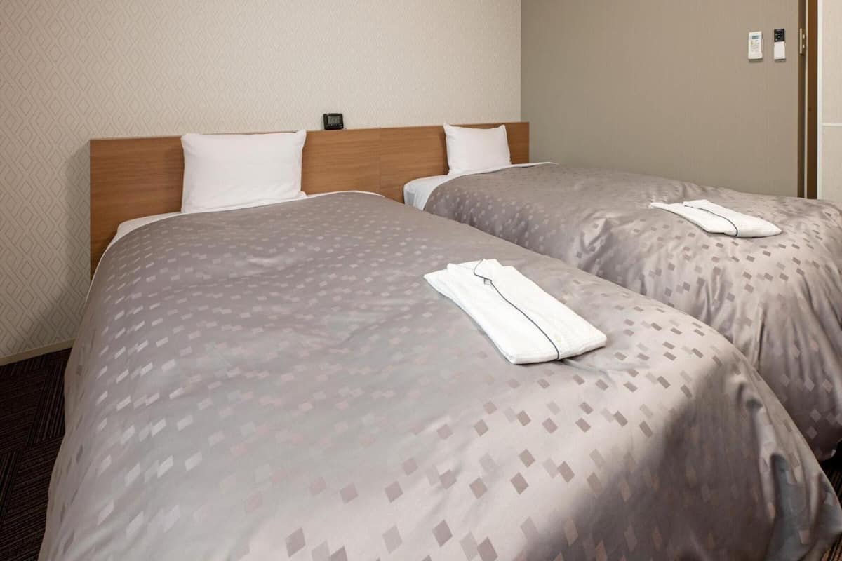 desk, blackout curtains, free wifi, bed sheets