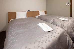Desk, blackout curtains, free WiFi, bed sheets