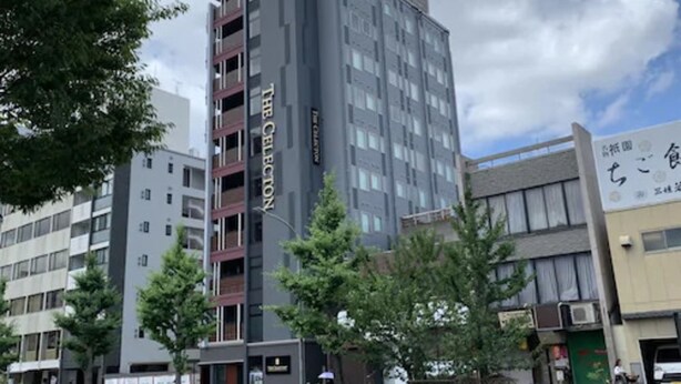 A multi-story building with a sign reading "The Celestion."