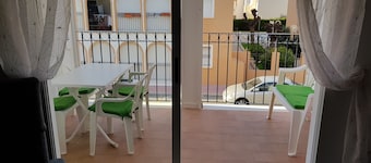 Perfectly located, refurbished apartment in a gated complex with pool and garden