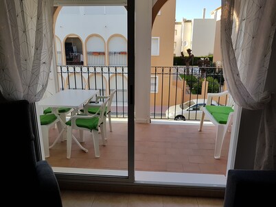 Perfectly located, refurbished apartment in a gated complex with pool and garden