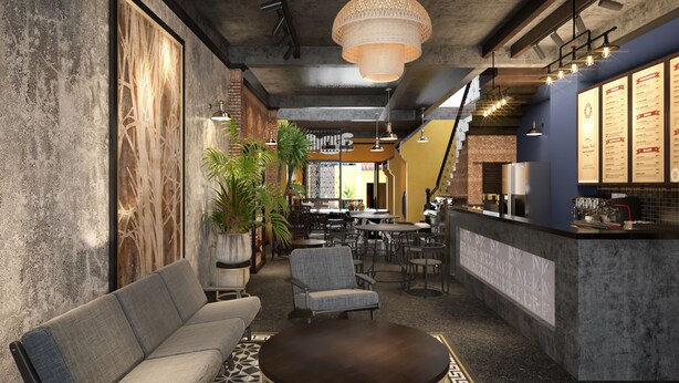 Un interior moderno con una zona de bar, asientos y una escalera.