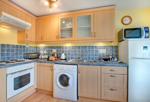 Fridge, microwave, oven, high chair