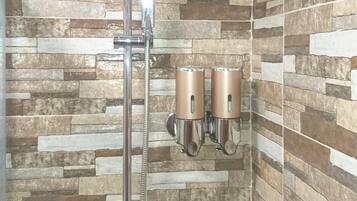 Hair dryer, towels, soap, shampoo