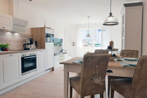Fridge, oven, dishwasher, high chair