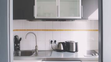 Microwave, coffee/tea maker, cookware/dishes/utensils