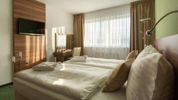 Hypo-allergenic bedding, in-room safe, desk, soundproofing