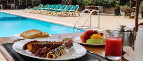 Breakfast, lunch, dinner served; local cuisine