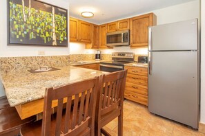 Microwave, dishwasher, coffee/tea maker, cookware/dishes/utensils