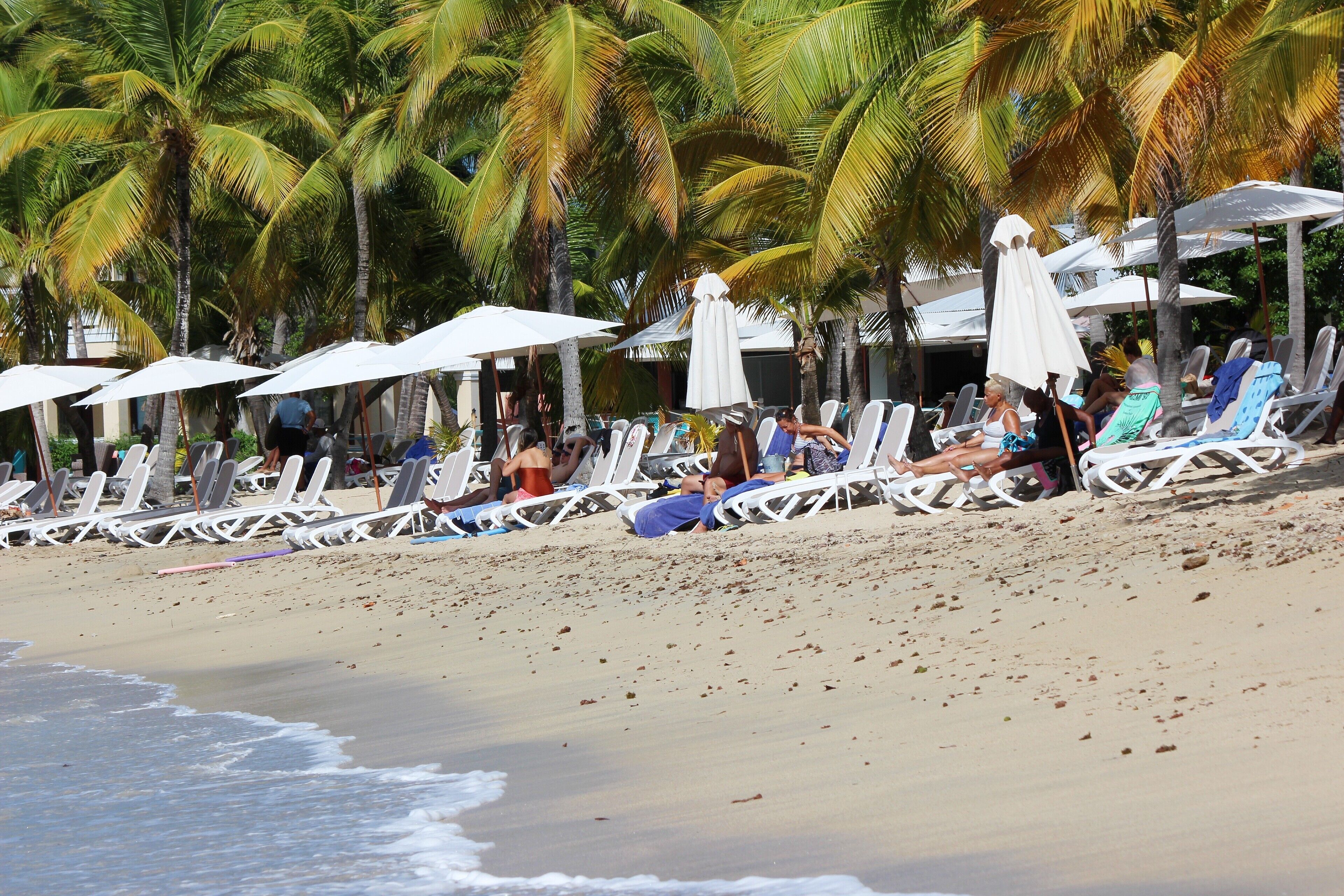 On the beach, sun-loungers, beach towels