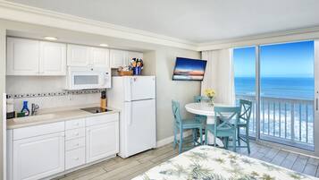 Fridge, microwave, stovetop, coffee/tea maker