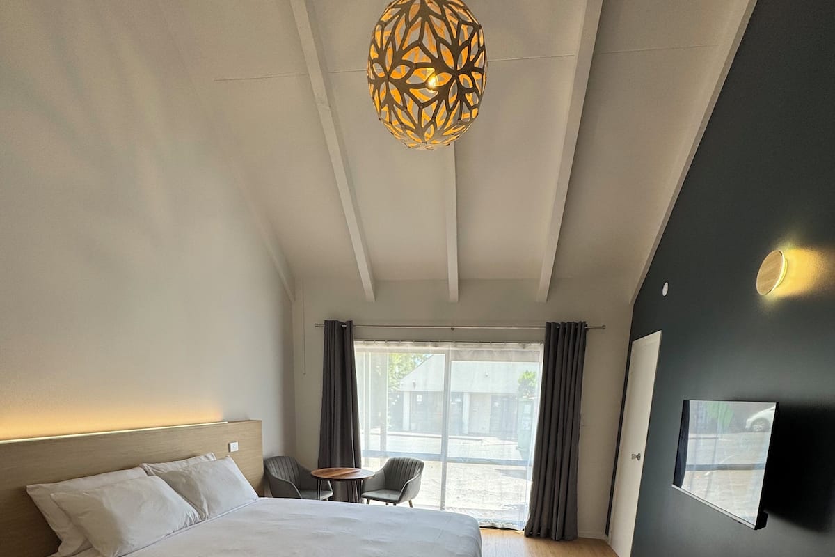 1 bedroom, laptop workspace, blackout curtains, iron/ironing board