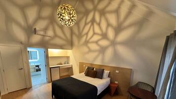 1 bedroom, laptop workspace, blackout drapes, iron/ironing board