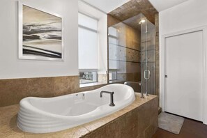 Shower, hair dryer, towels, shampoo