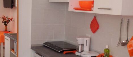 Fridge, microwave, coffee/tea maker, toaster