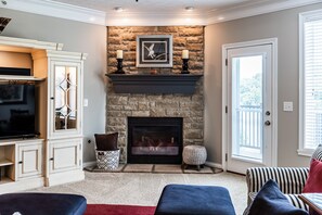 Smart TV, fireplace, DVD player, books