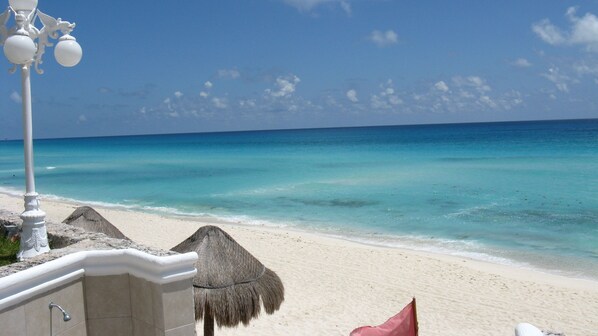 On the beach, sun loungers
