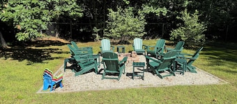 Game Room, 2 family rooms, on 3 levels, with a fenced yard and firewood provided