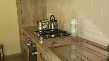 Apartment, 2 Bedrooms | Private kitchen | Fridge, stovetop, cookware/dishes/utensils