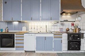 Appartamento (801) | Cucina privata | Frigorifero, microonde, piano cottura, macchina per tè/caffè