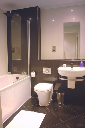 Designer toiletries, hair dryer, towels, soap