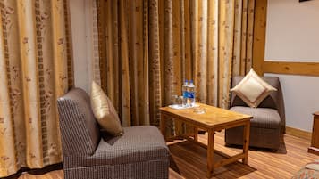 Family Room, 1 Single Bed | Living area | LCD TV