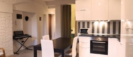 Apartament, 1 dormitori | Cuina privada | Frigorífic, microones, forn i placa de cuina