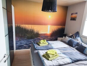 2 chambres, coffres-forts dans les chambres, fer et planche Ă repasser