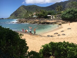 On the beach, sun-loungers, beach towels