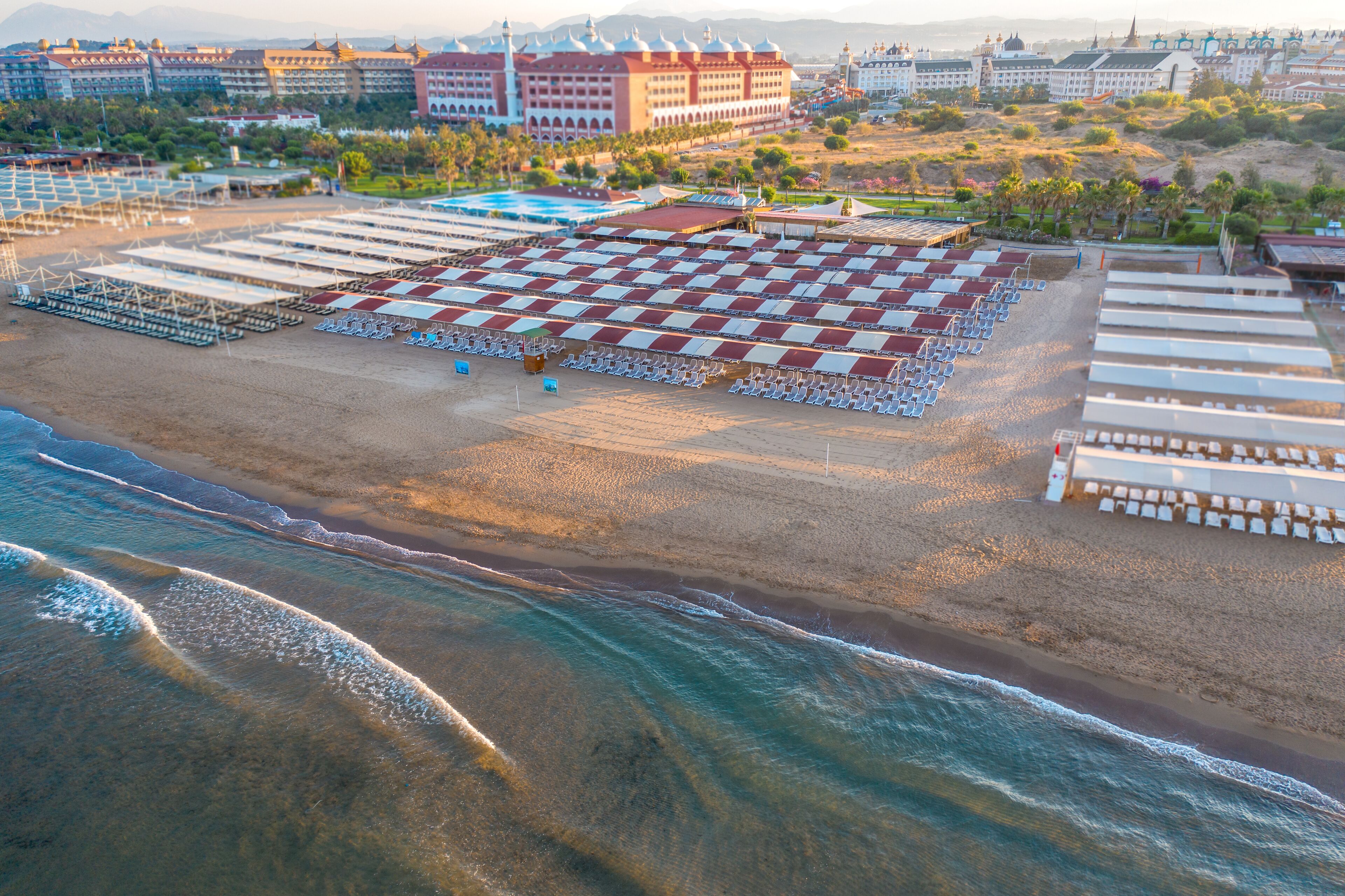 private beach nearby, free beach shuttle, sun-loungers, beach umbrellas