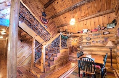 Huge 8 bdm 7 baths, log cabin with views!!! sleeps 35, eating for 28, pets ok

