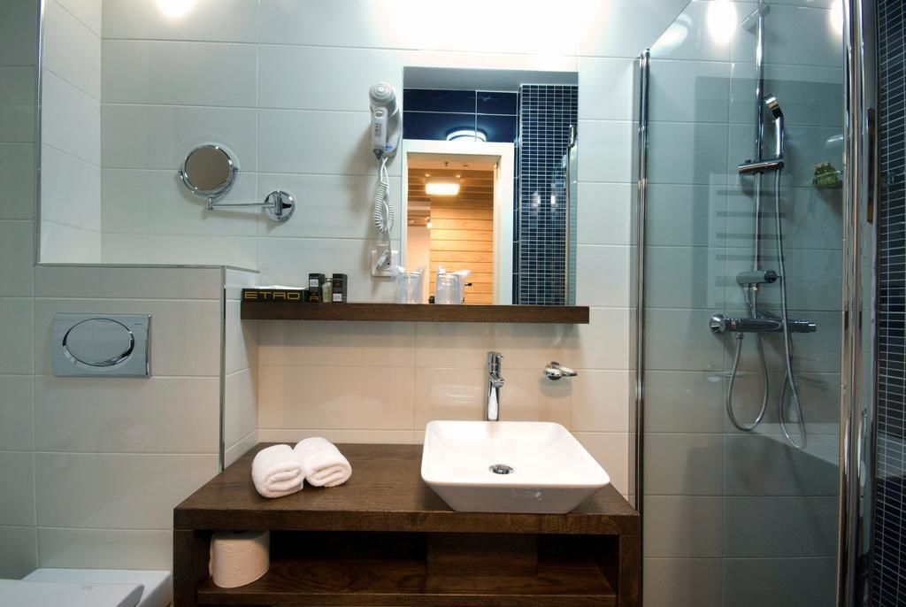 junior suite | bathroom | hair dryer, bathrobes, slippers, towels
