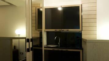 Suite estándar | Ropa de cama de alta calidad, minibar, sistema de insonorización