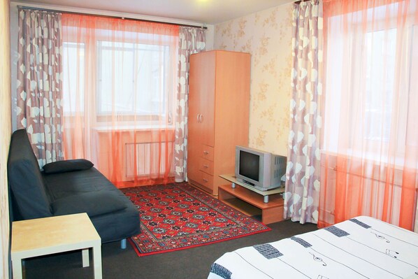 Apartment, 1 Doppelbett und Schlafsofa, Stadtblick | Bügeleisen/Bügelbrett, kostenloses WLAN, Bettwäsche